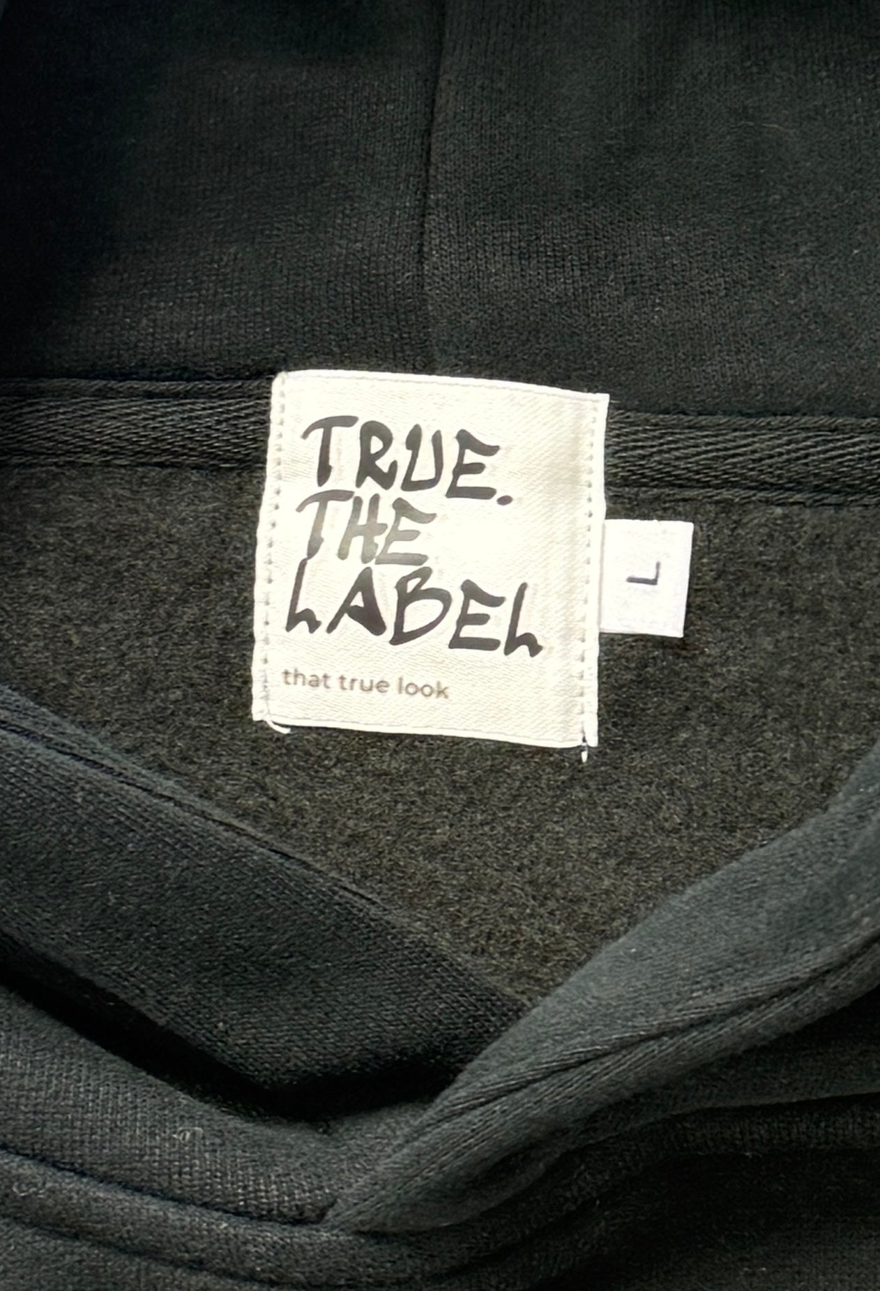 Oversized Fleece Hoodie with White True. Label Design
