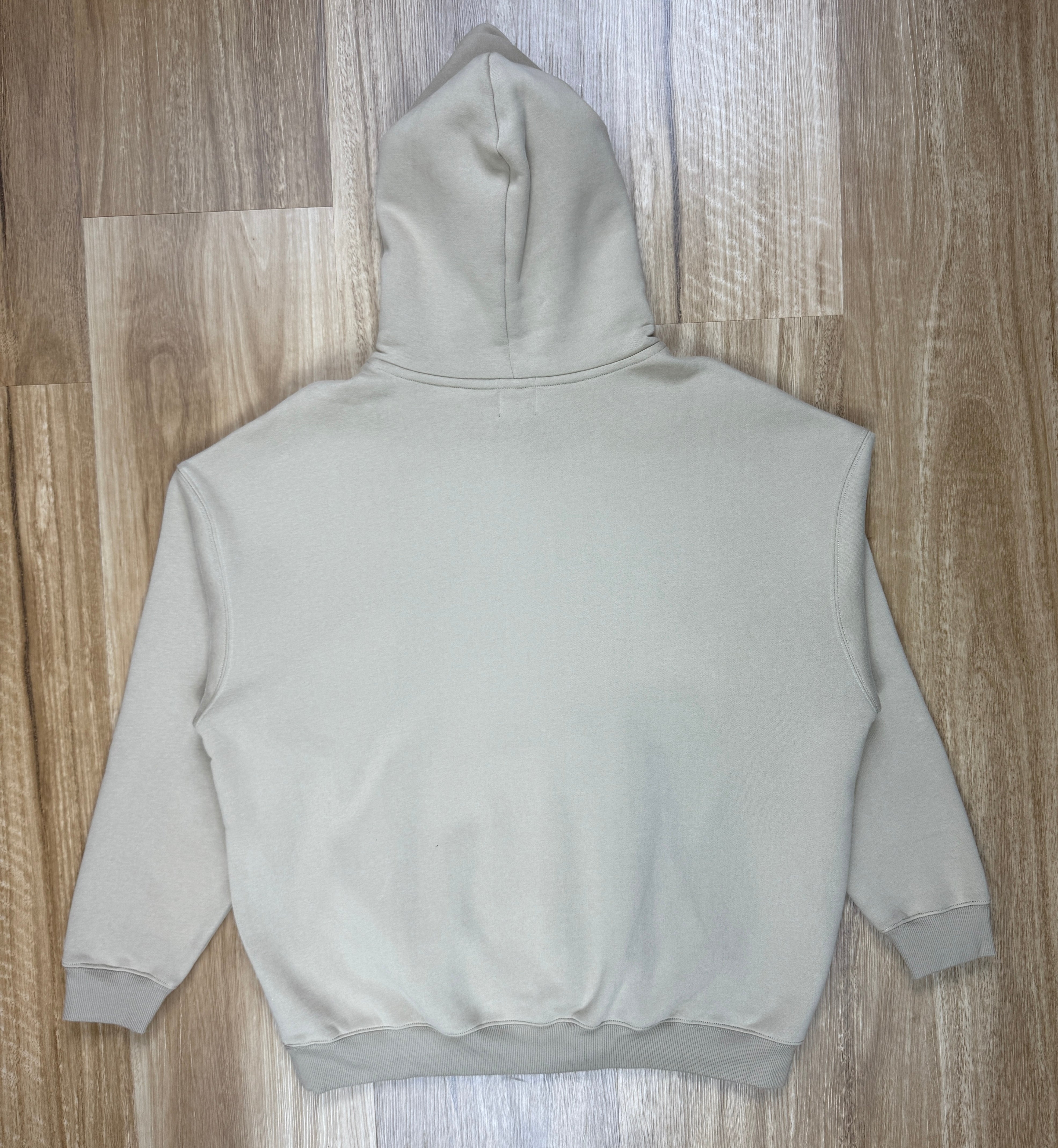 Oversized Sand Fleece Unisex Hoodie with Chocolate TRUE. Design