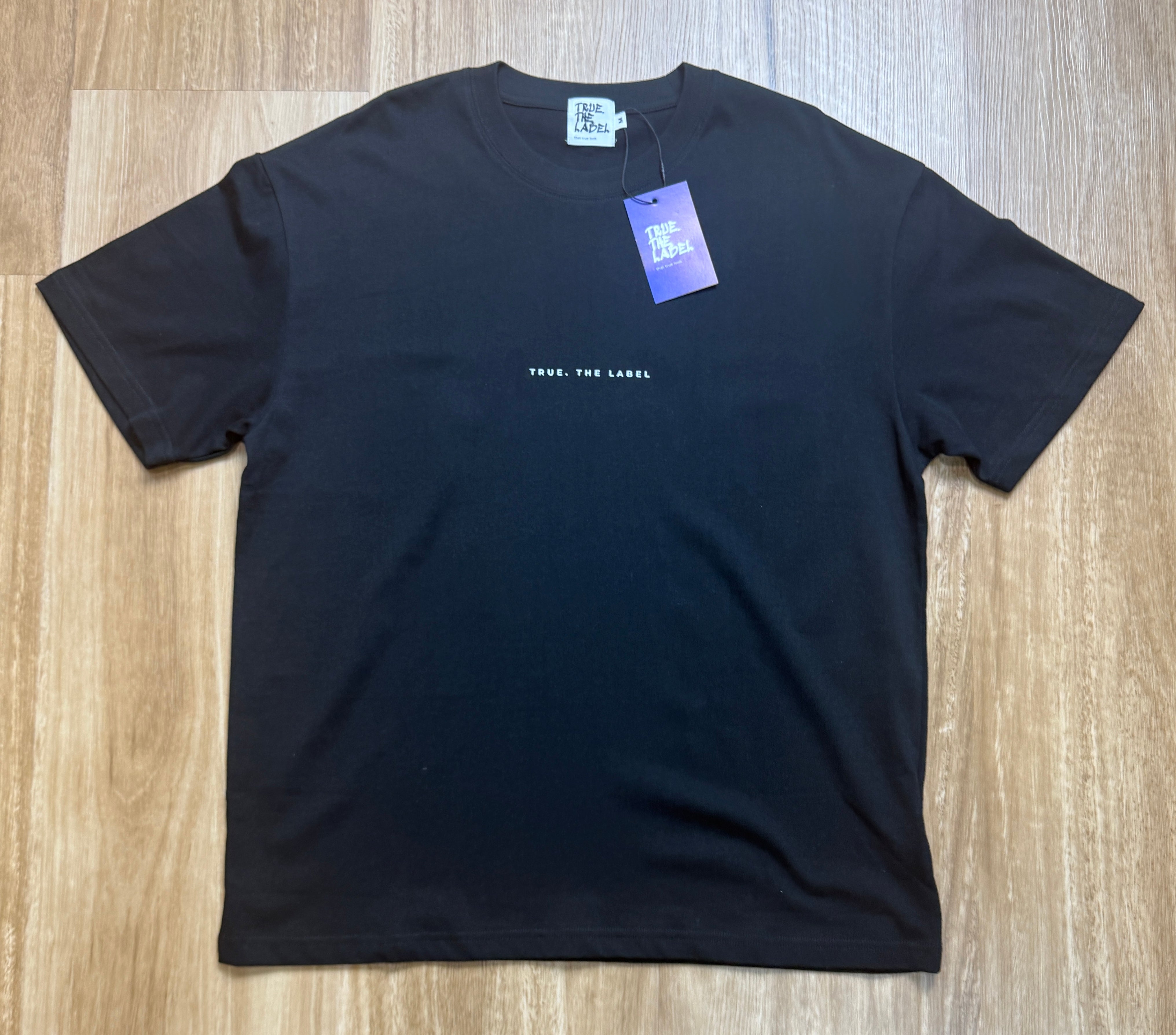 Unisex Classic Fit True. the Label Black Tee