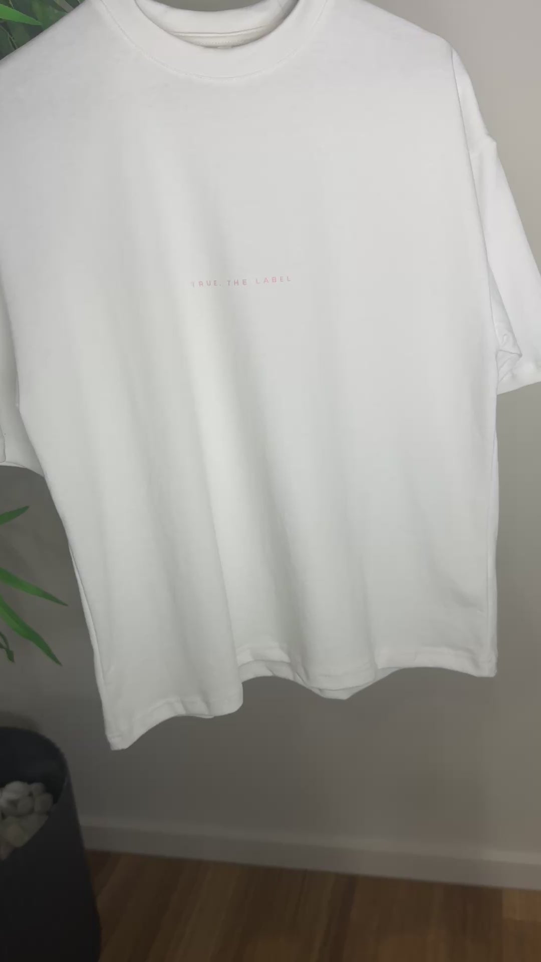 Load video: Women&#39;s Boxy Fit True. the Label in Baby Pink White Tee